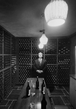 Alfred Hitchcock in his wine cellar, mid-1960s